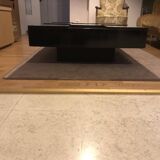 Coffee table with stainless steel checkered top and black formica