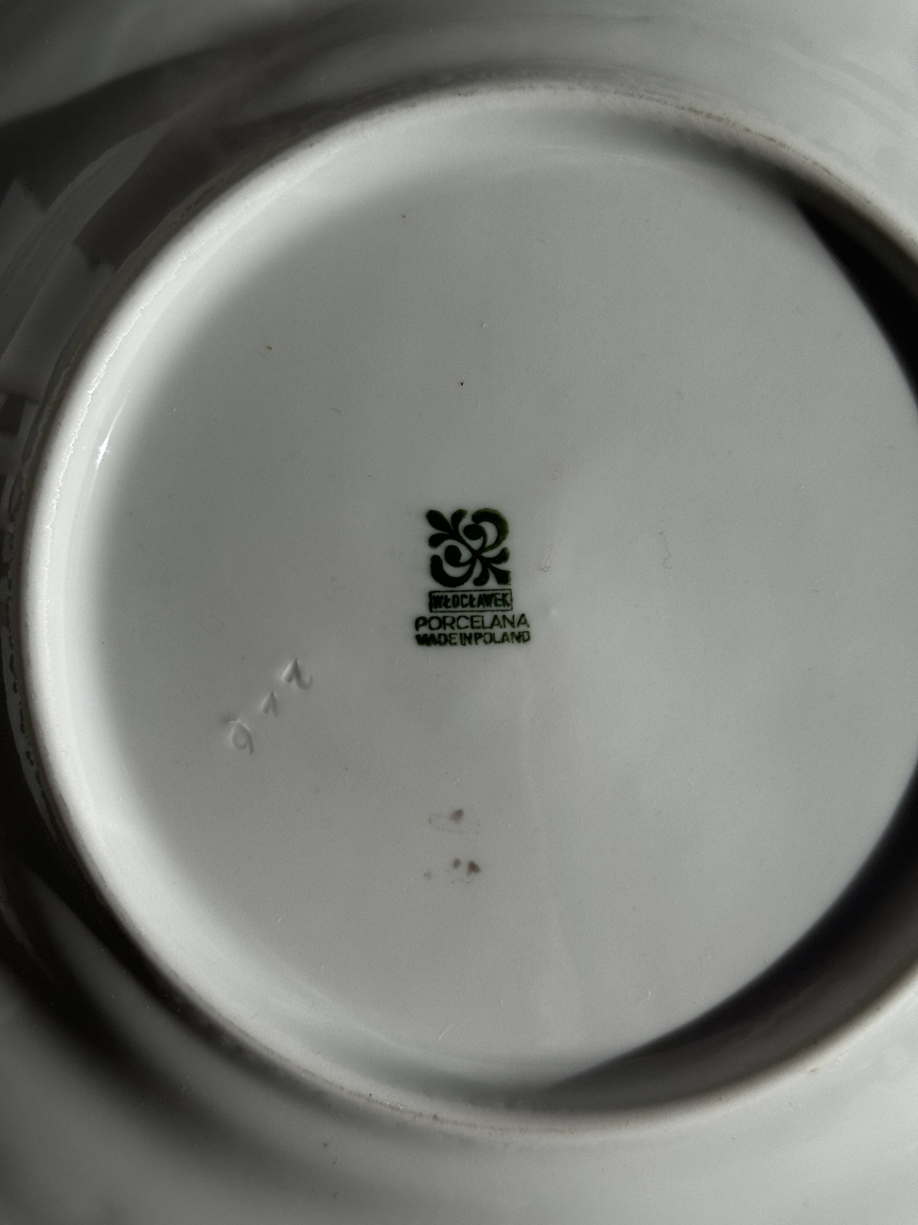 Set of 6 vintage dessert plates made in Poland with a plant motif.