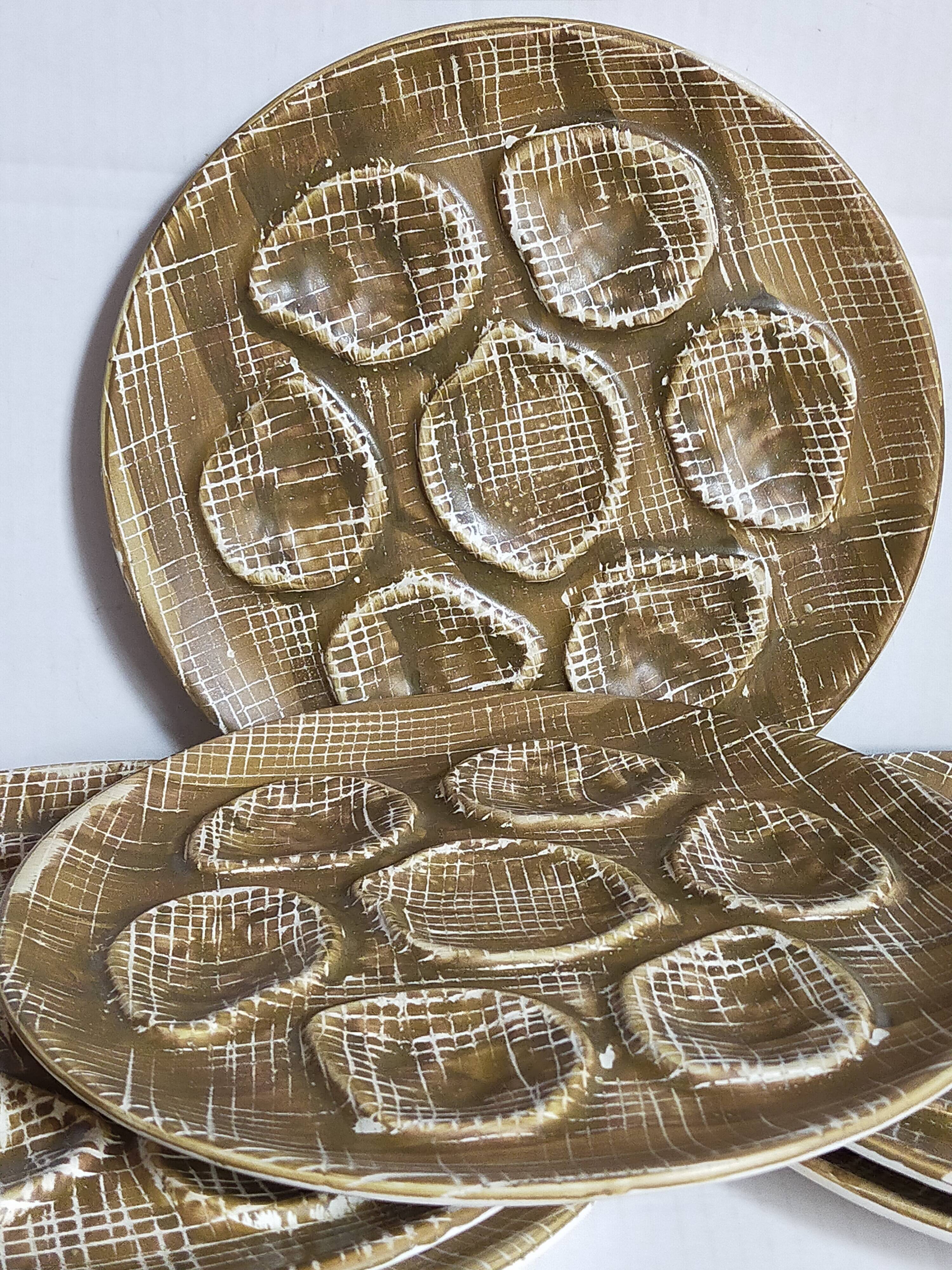 Six oyster plates earthenware with matte enamel, 50s
