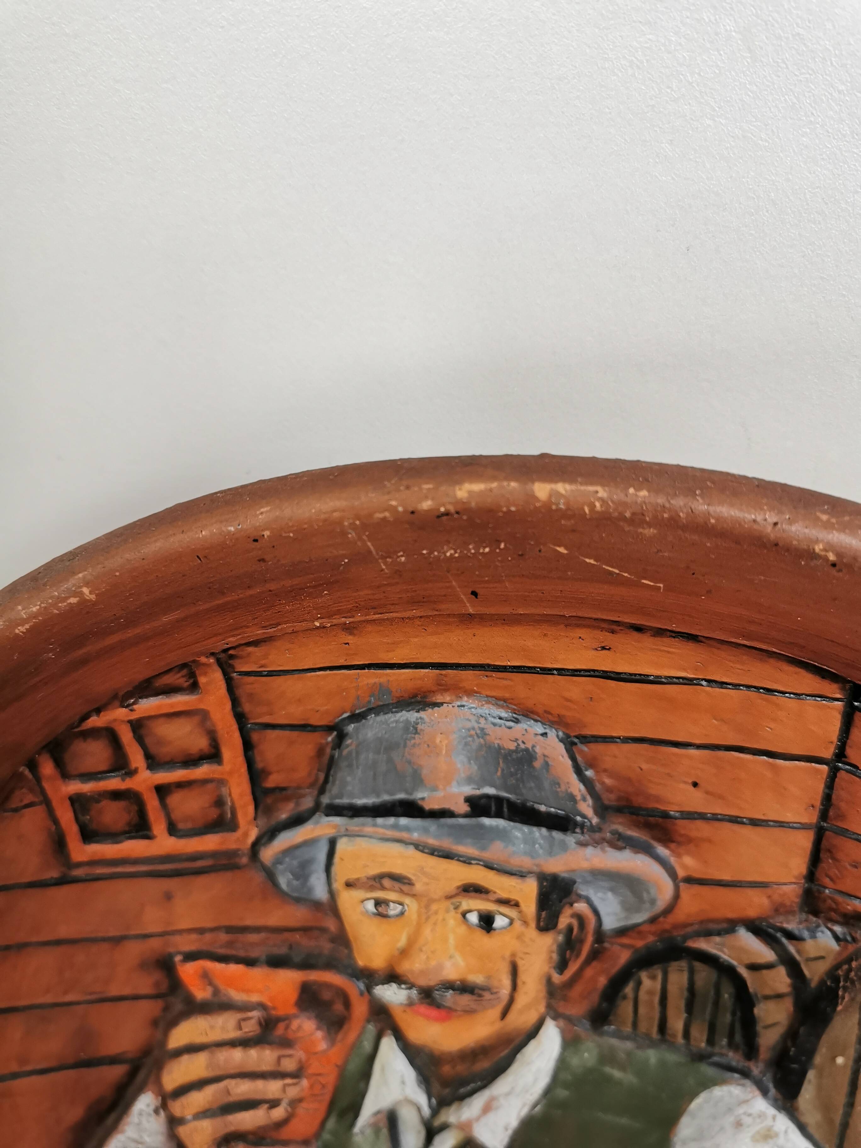 Vintage Embossed Clay Plate: Man Drinking, Retro Wall Decor