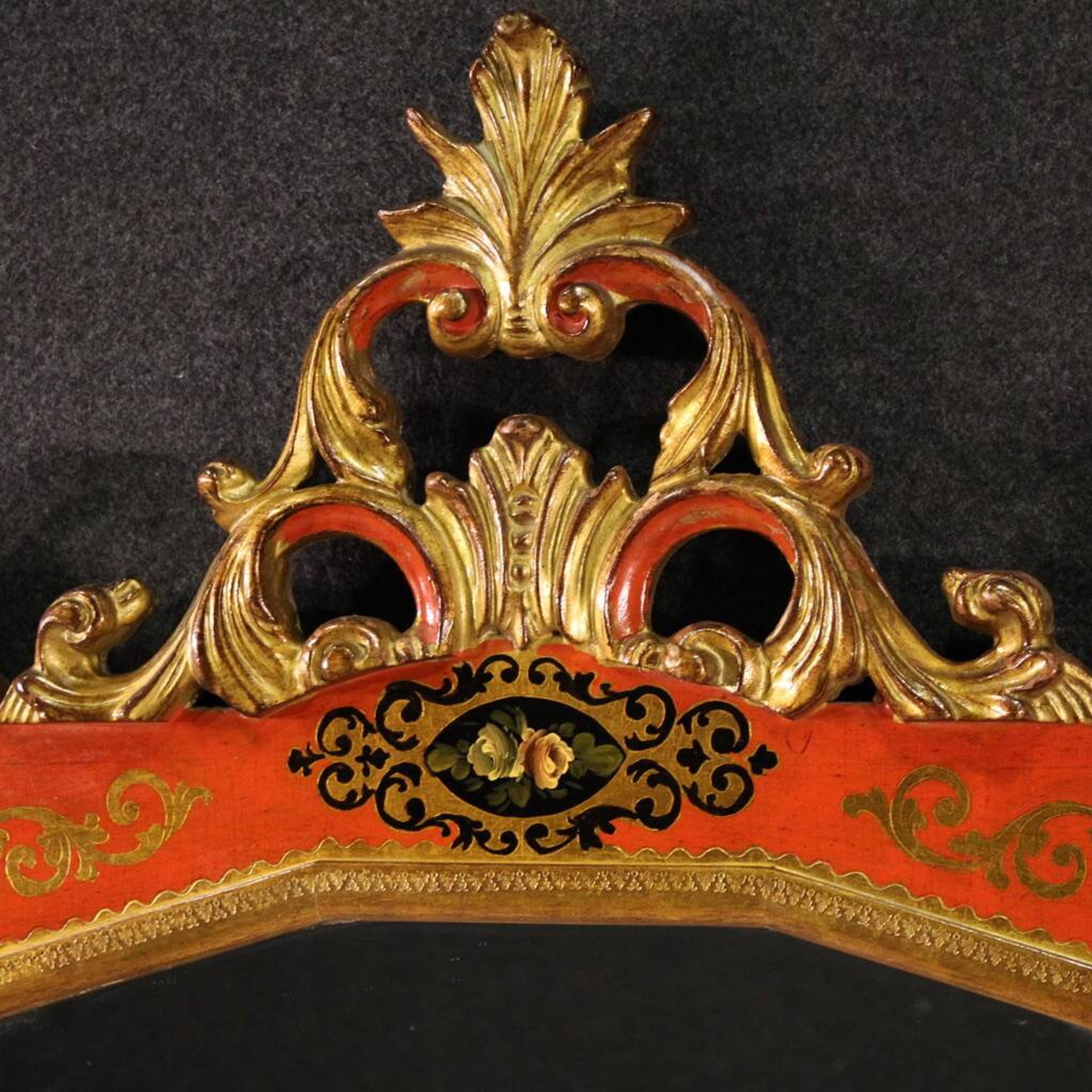 Miroir toscan laqué et doré du XXe siècle