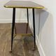 Vintage side table, brass gallery and wheels, 1950s.