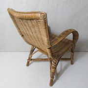 Ancien fauteuil en rotin pour enfant
