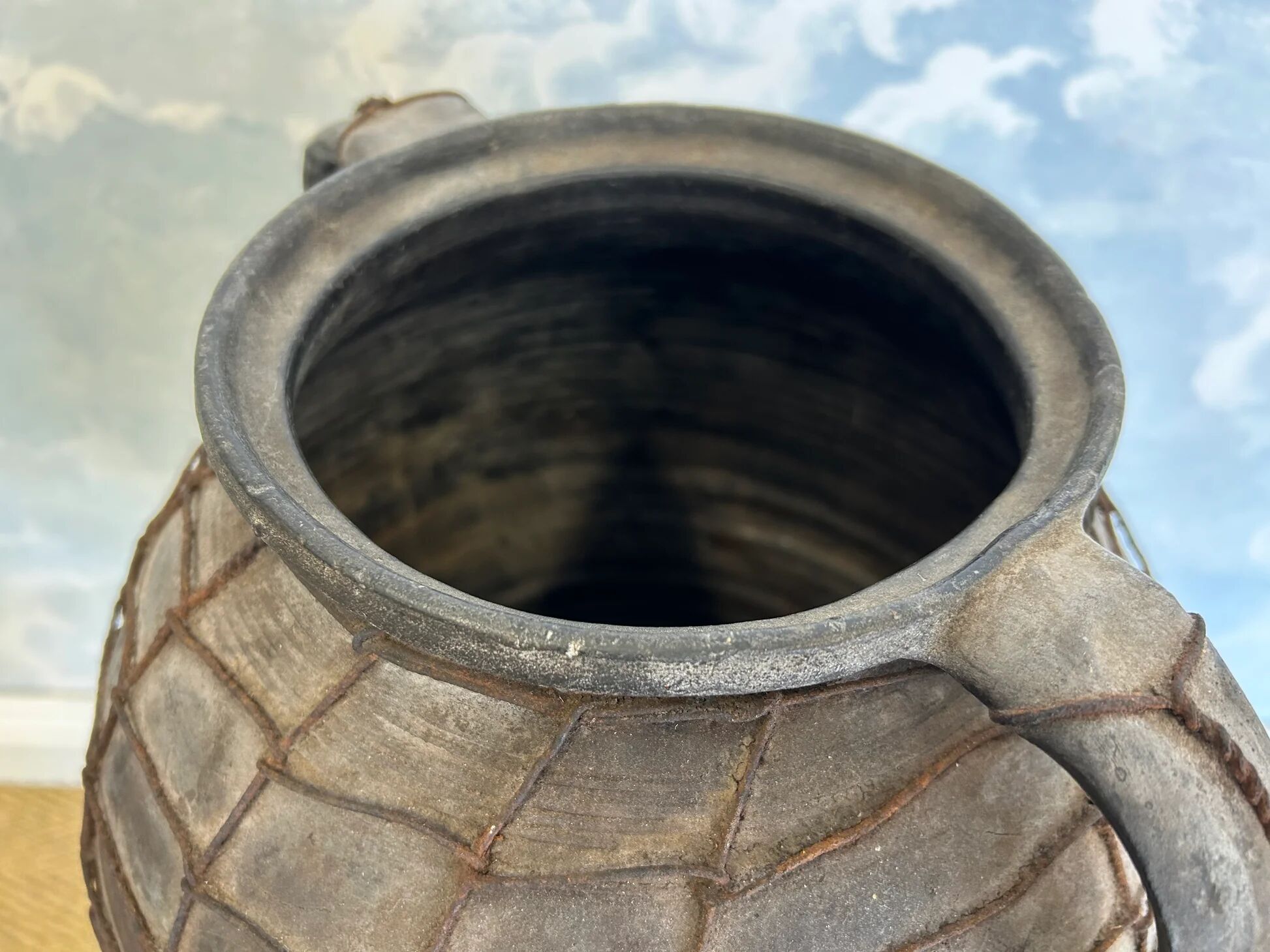 Artisan clay amphora with wire mesh, Romania, circa 1950