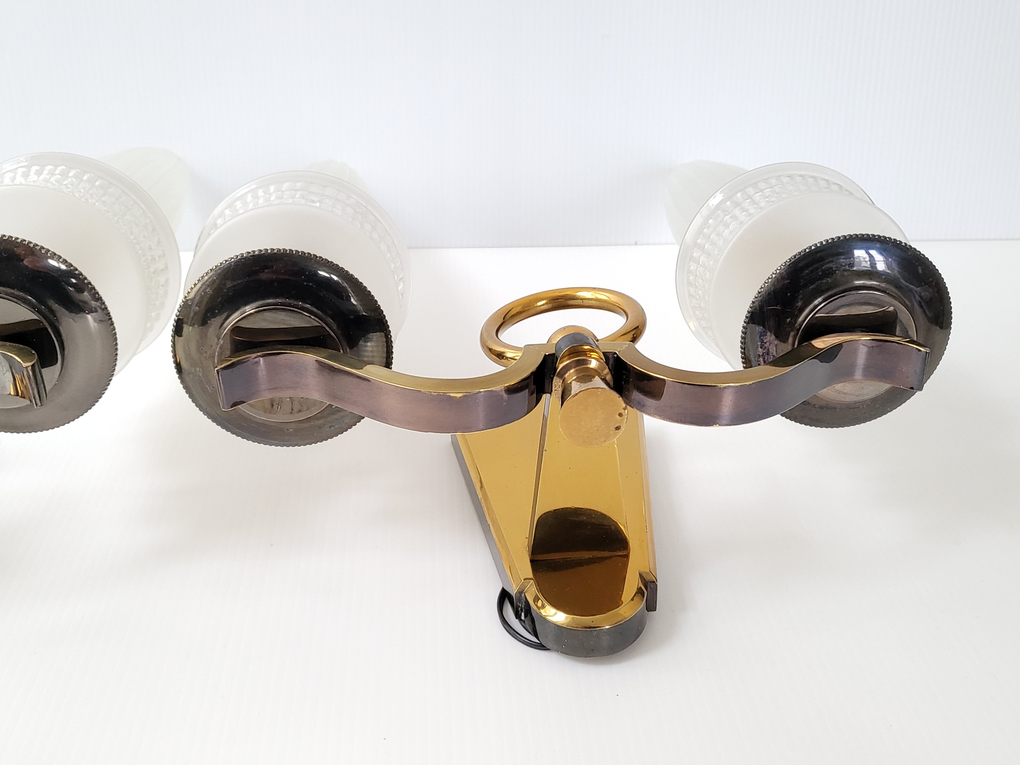 Pair of vintage bronze wall lamps house Libéros 1950