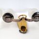 Pair of vintage bronze wall lamps house Libéros 1950