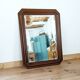 Miroir octogonal en bois.