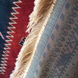 Wall rug with oriental patterns.