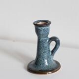 Antique candle holder in glazed ceramic