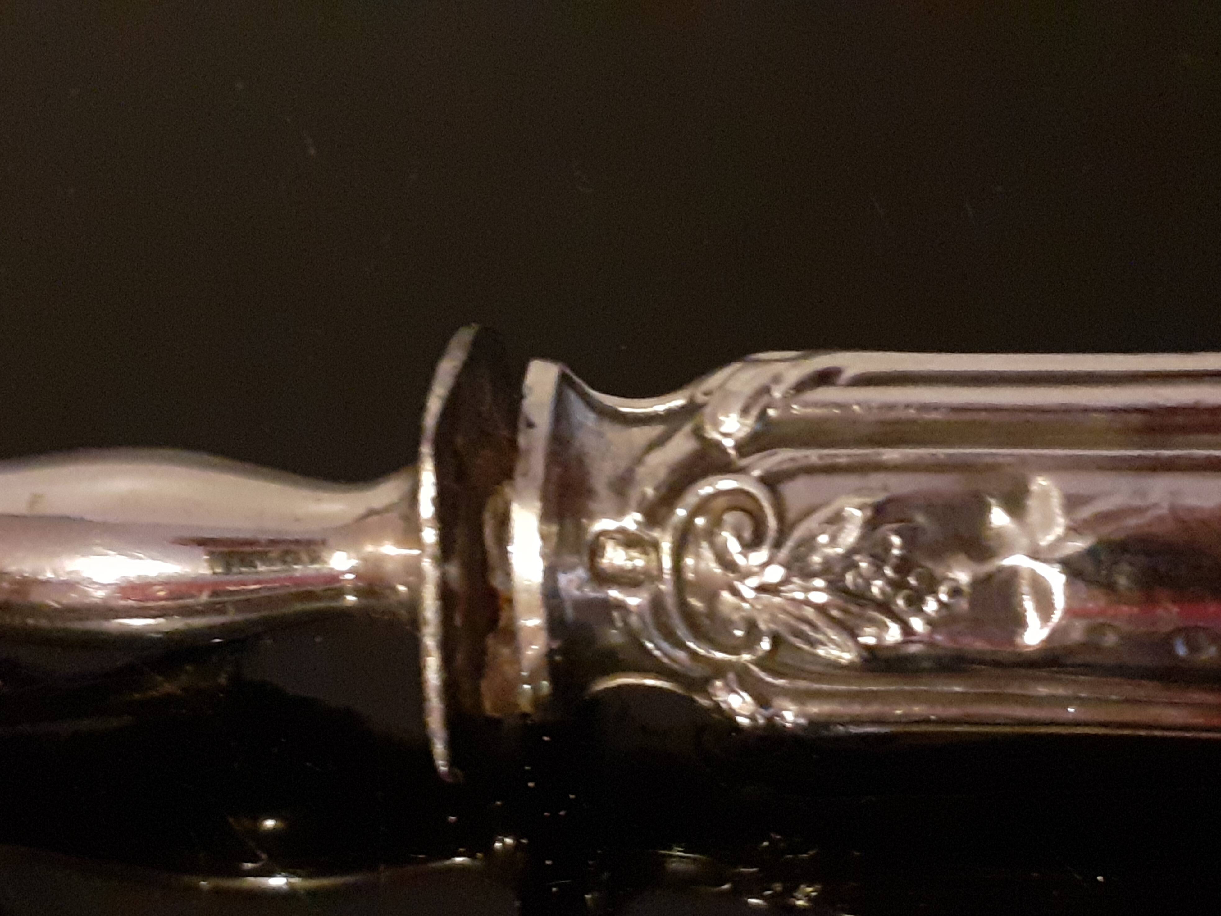 Carving service / Silver sheaths with Minerva punches