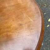 Round side table with a central pedestal in solid wood