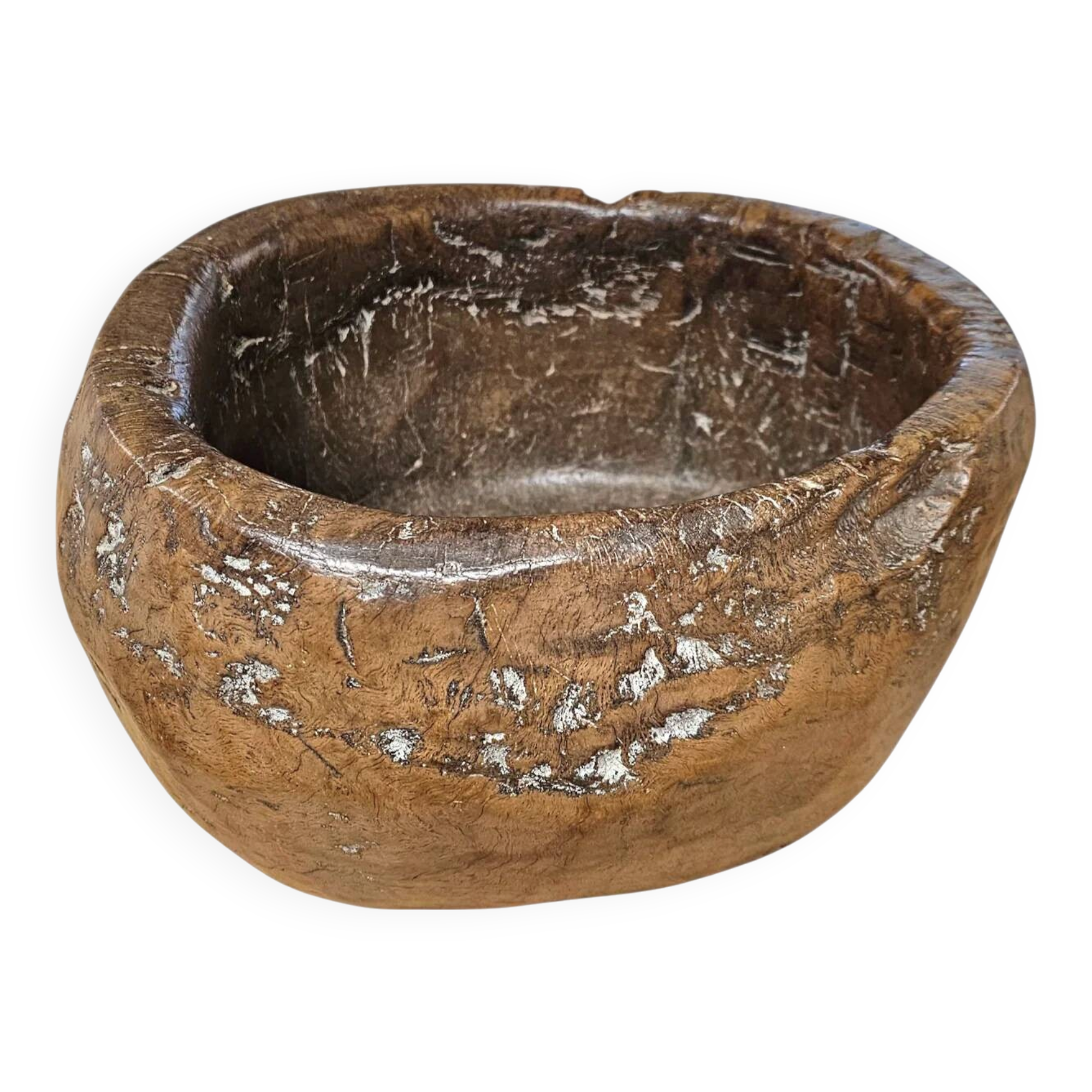 A substantial hand-hewn wooden bowl carved from a single burl section