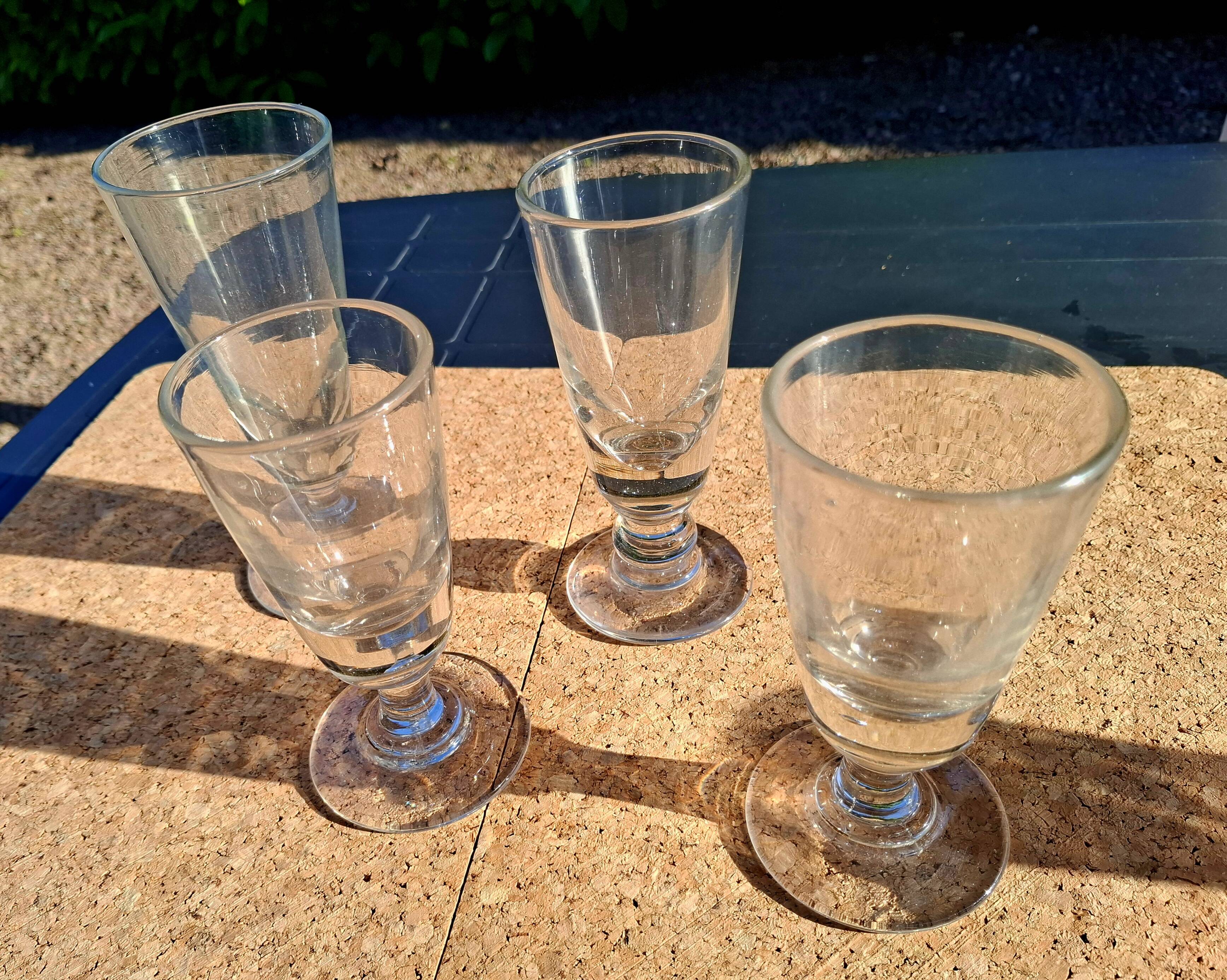 II. 4 19th century glasses (absinthe) of different heights