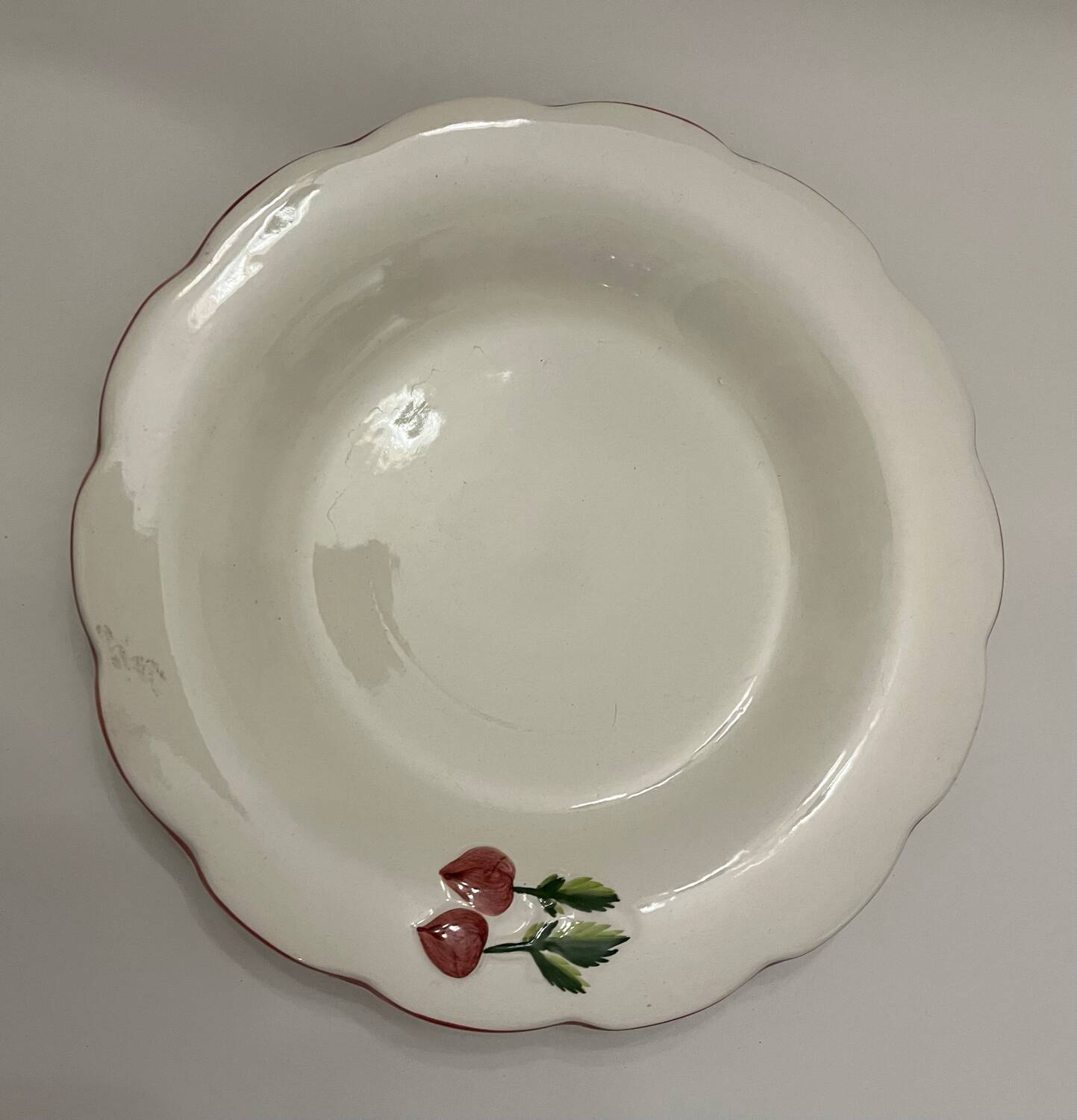 Earthenware draining salad bowl