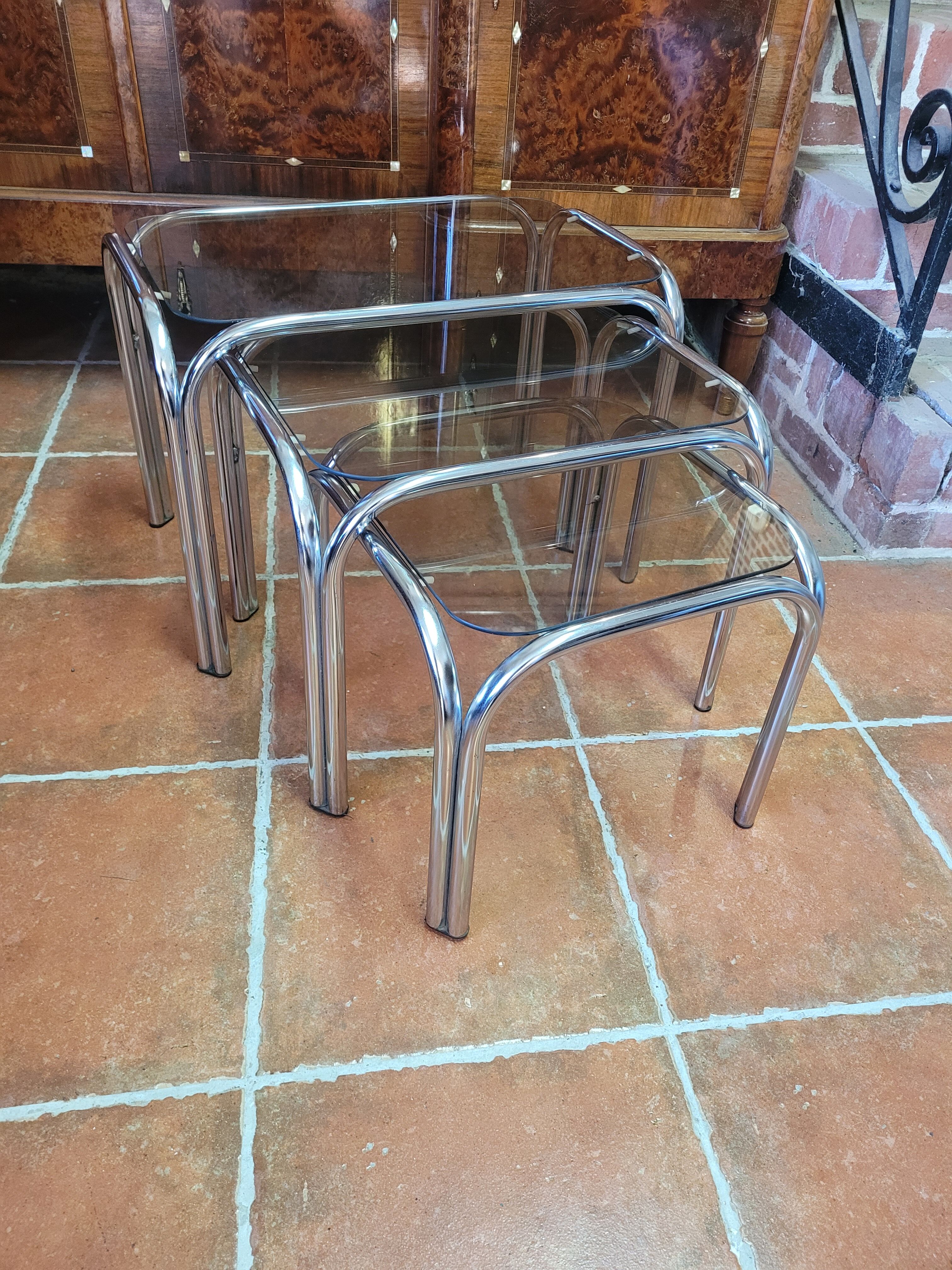 Chrome nesting table with smoked glass top from the 70s