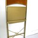 Chaise pliante en velours et métal doré