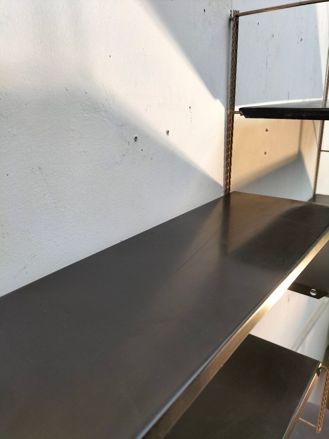 Metal wall shelf