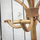 Rattan parrot coat rack