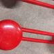 Set of 4 red metal coat hooks