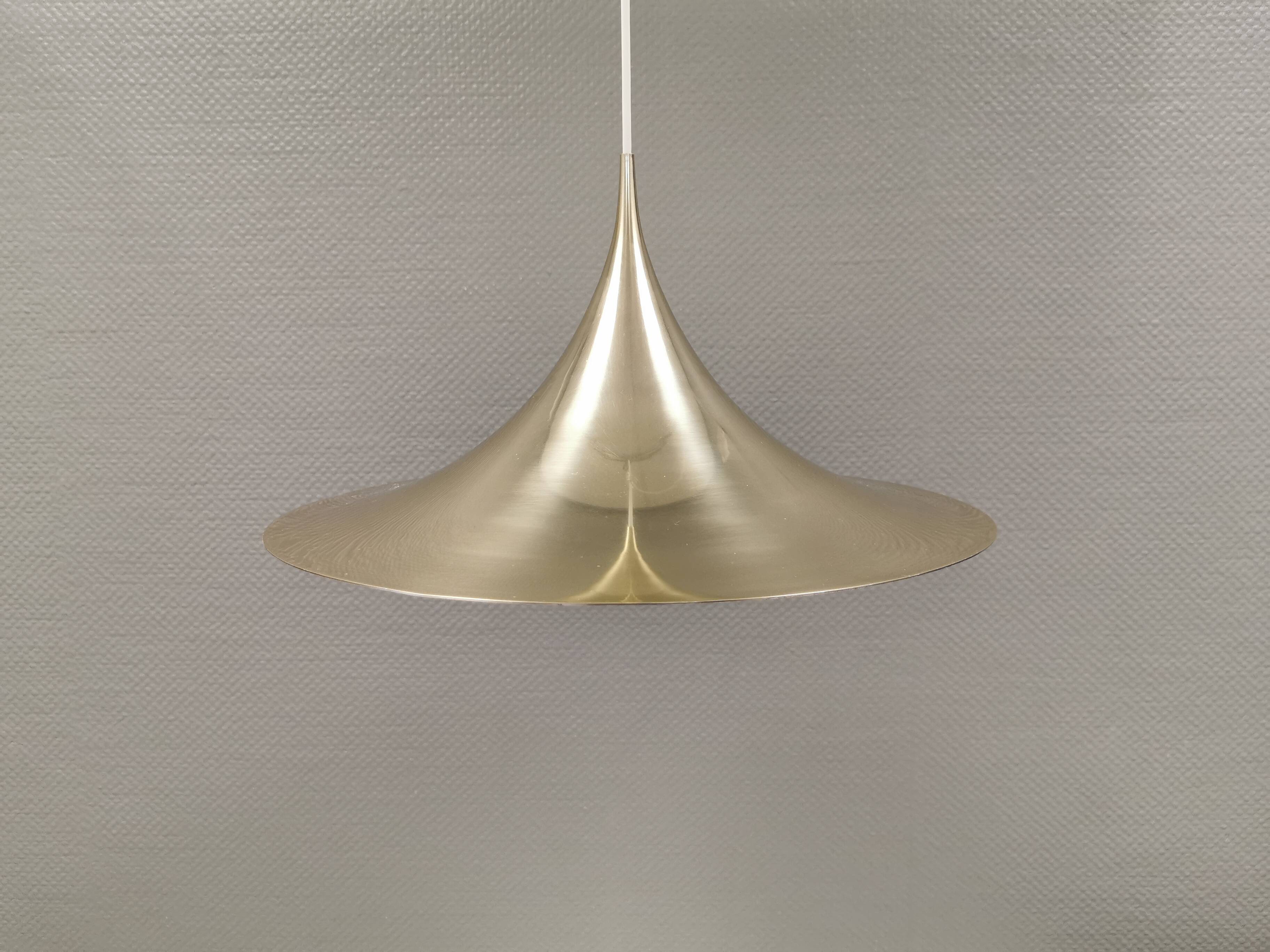 Golden semi hanging lamp, designed by bonderup & thorup Denmak 1974