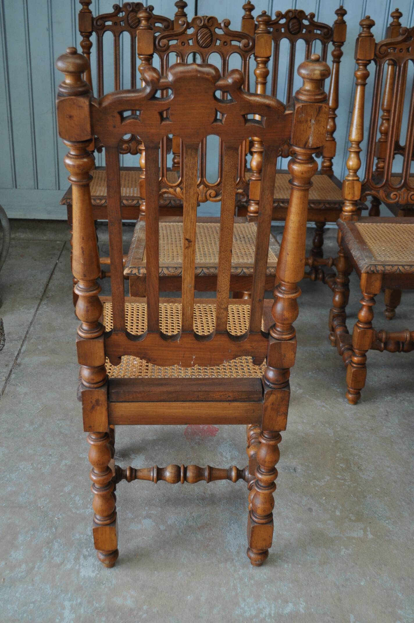 Set of 8 tanned chairs.