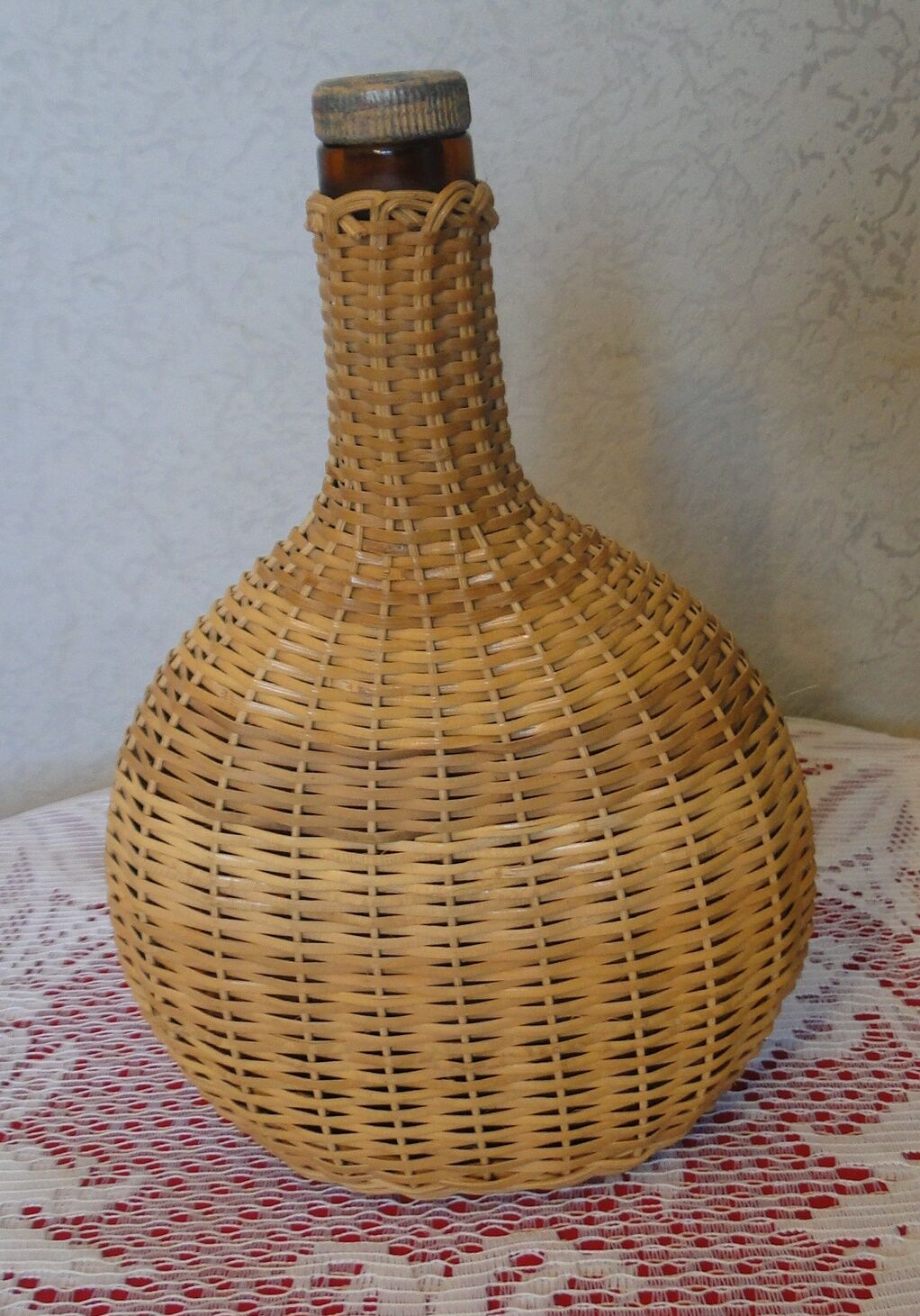 Vintage wicker covered flat bottle