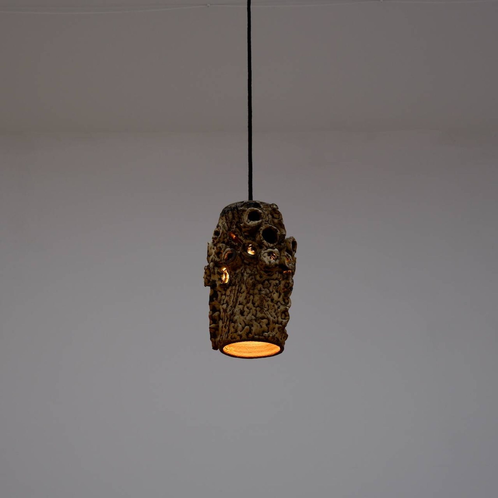 Sculptural ceramic pendant lamps by Bodil Marie Nielsen