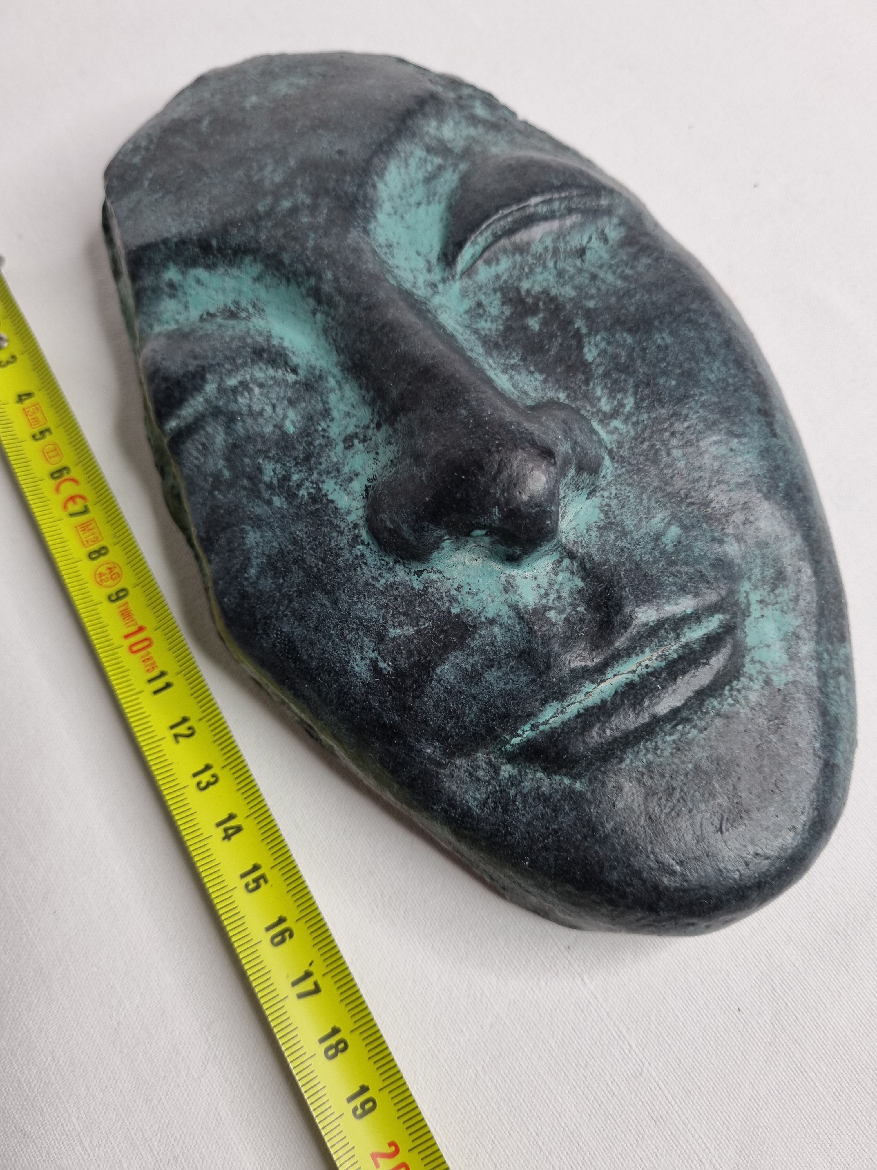 Patinated plaster replica of an ancient Greek face, signed