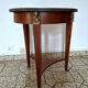 Empire guéridon table in mahogany with a black marble top and gilded bronze.