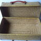 Old rattan case with leather straps and wooden handle