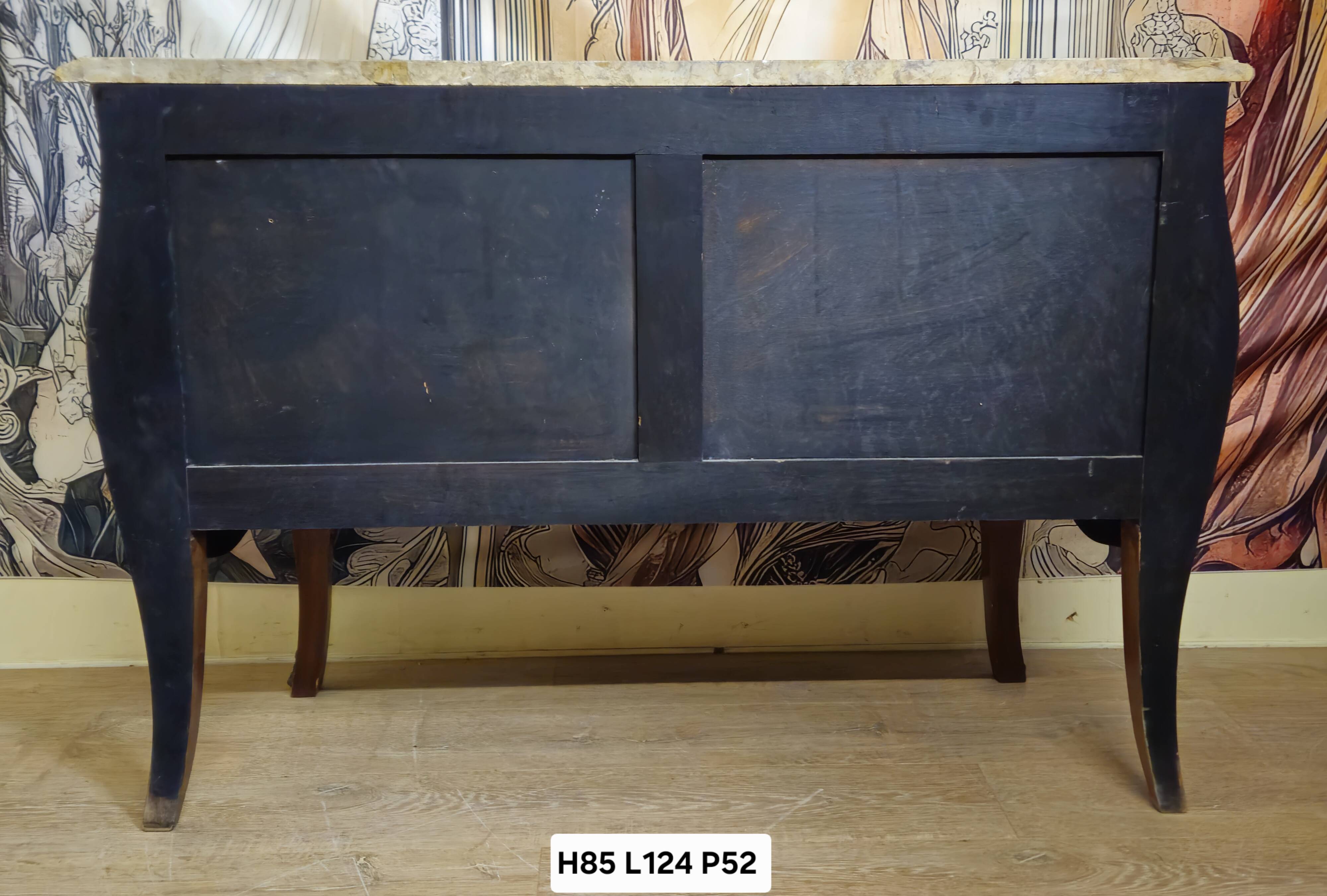 Curved Louis XV style commode with floral marquetry and marble top.