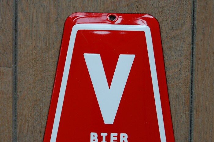 Advertising plate in enamelled sheet metal of the famous Belgian beer Vedett
