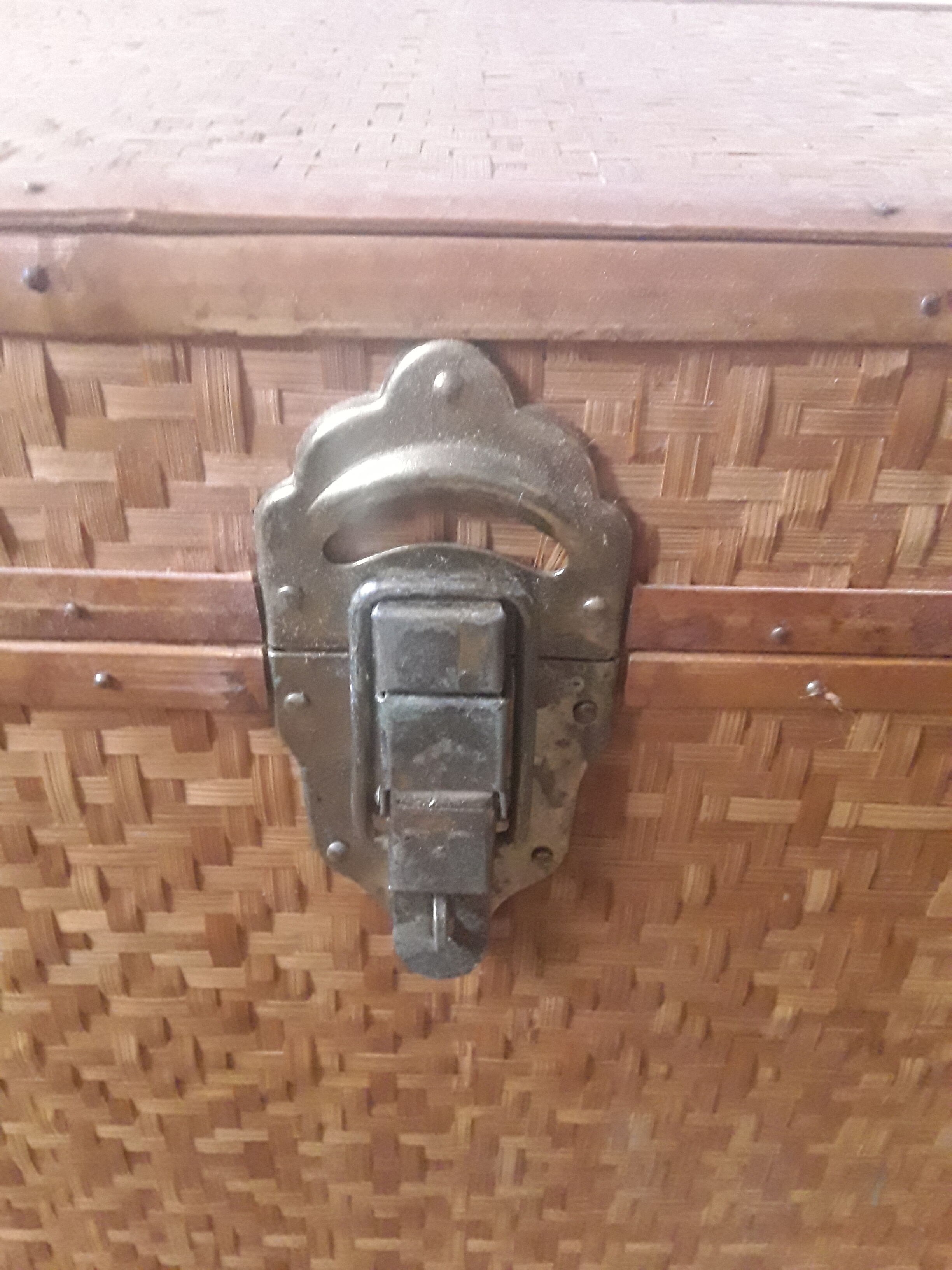 Wooden trunk with braiding
