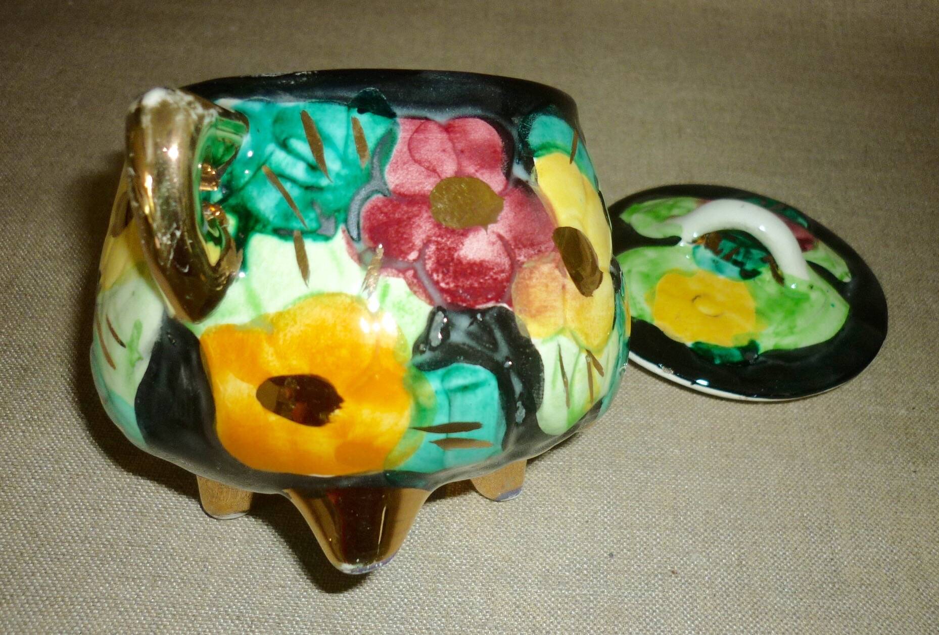 Multicolored ceramic covered tripod pot