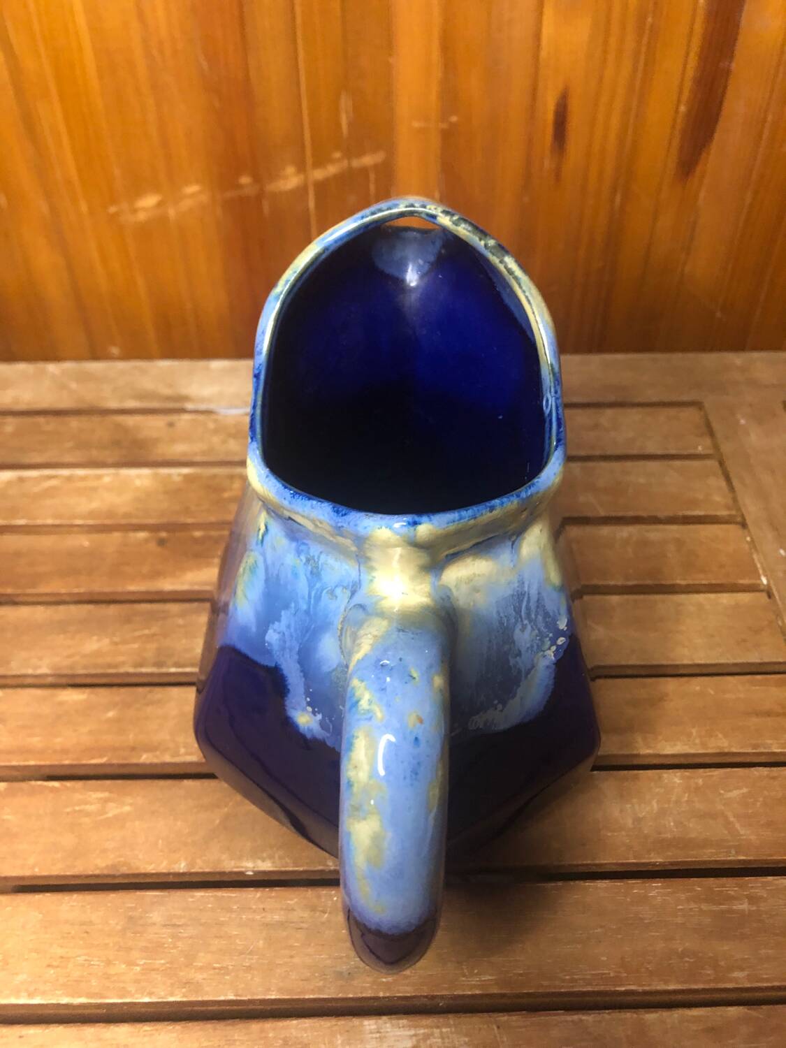 Old vintage blue ceramic pitcher