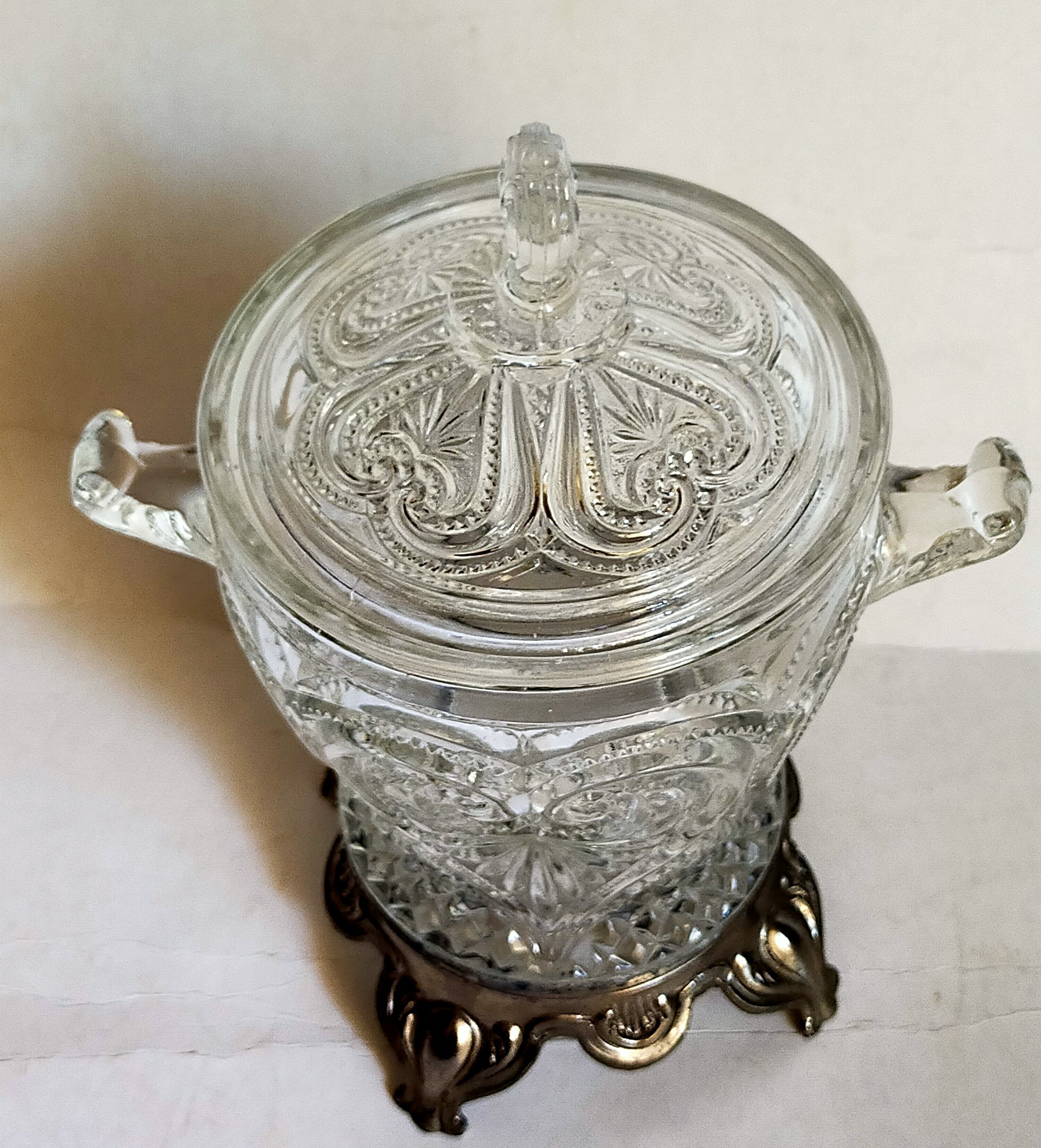 Antique glass compotier on metal stand