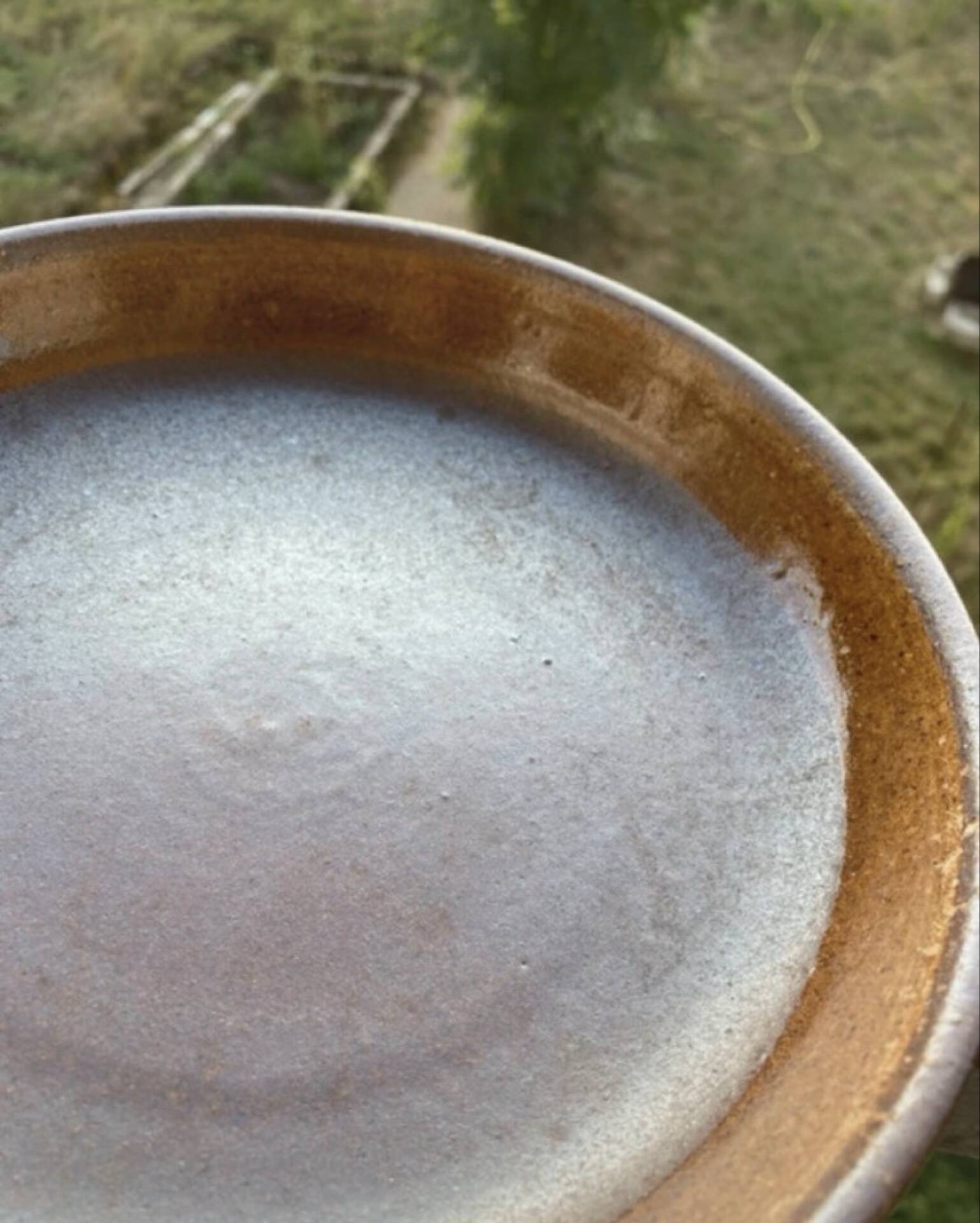 Organic earthenware deep plates from Gré du Marais, France.
