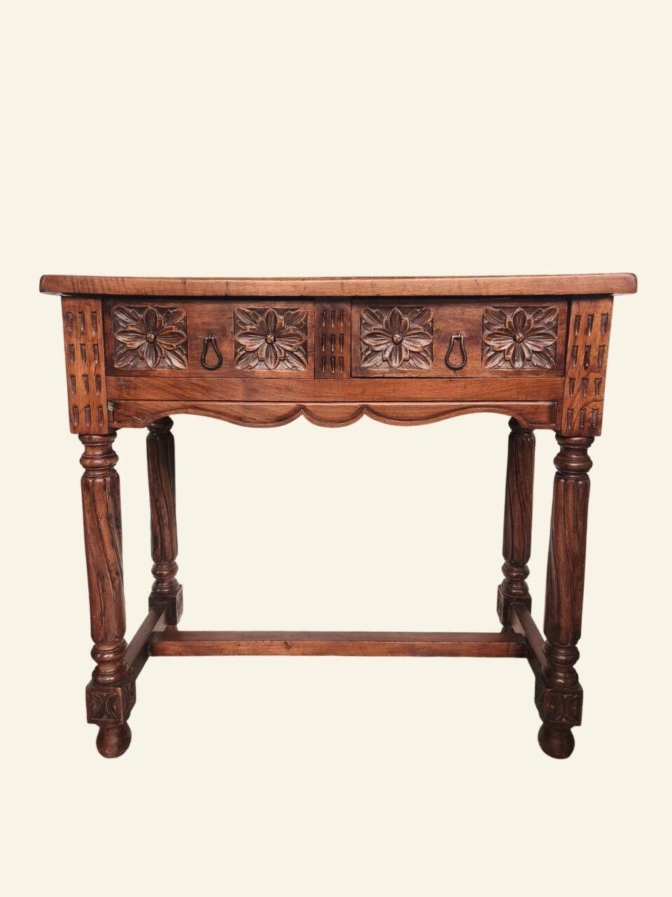 Castilian console table in carved walnut, early 20th century.