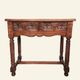 Castilian console table in carved walnut, early 20th century.