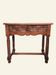 Castilian console table in carved walnut, early 20th century.