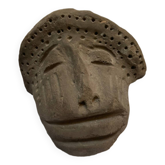 Primitive art head sculpture