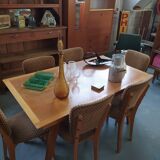 Dining table with compass feet