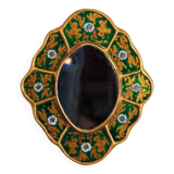 Golden mirror with decor