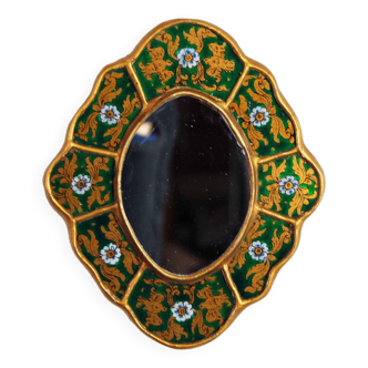 Golden mirror with decor