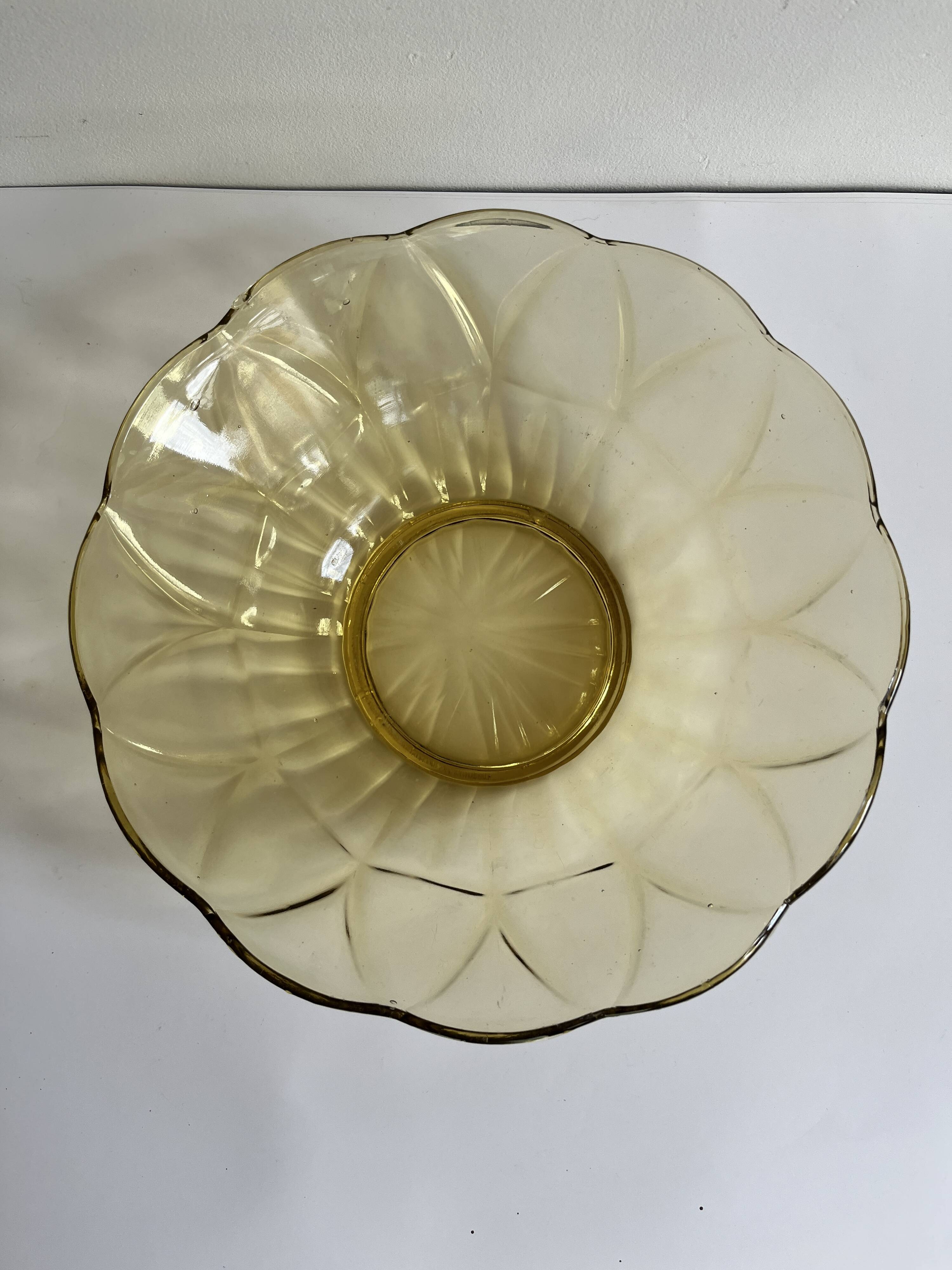 Yellow glass salad bowl
