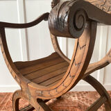 Dagobert armchair in carved wood