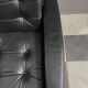 2 Black leather arm chairs 1960s on wheels