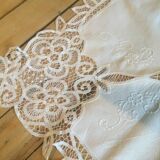 Embroidered white tablecloth and lace