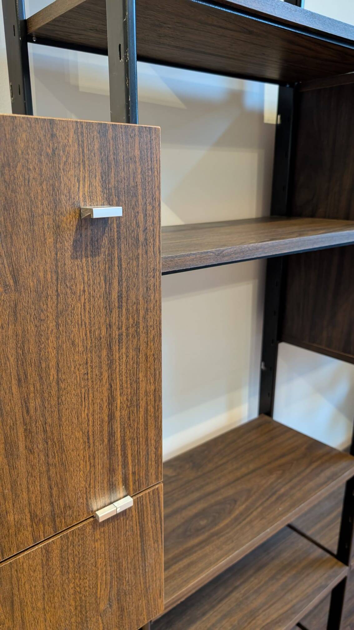 Modular rosewood bookcase by Pierre Guariche for Meurop