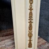 Louis XVI fireplace made in the 19th century, all in lacquered and gilded wood with decorative attributes